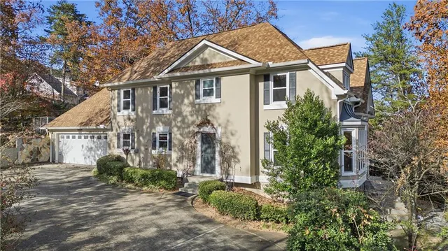 front view of a house with a small yard