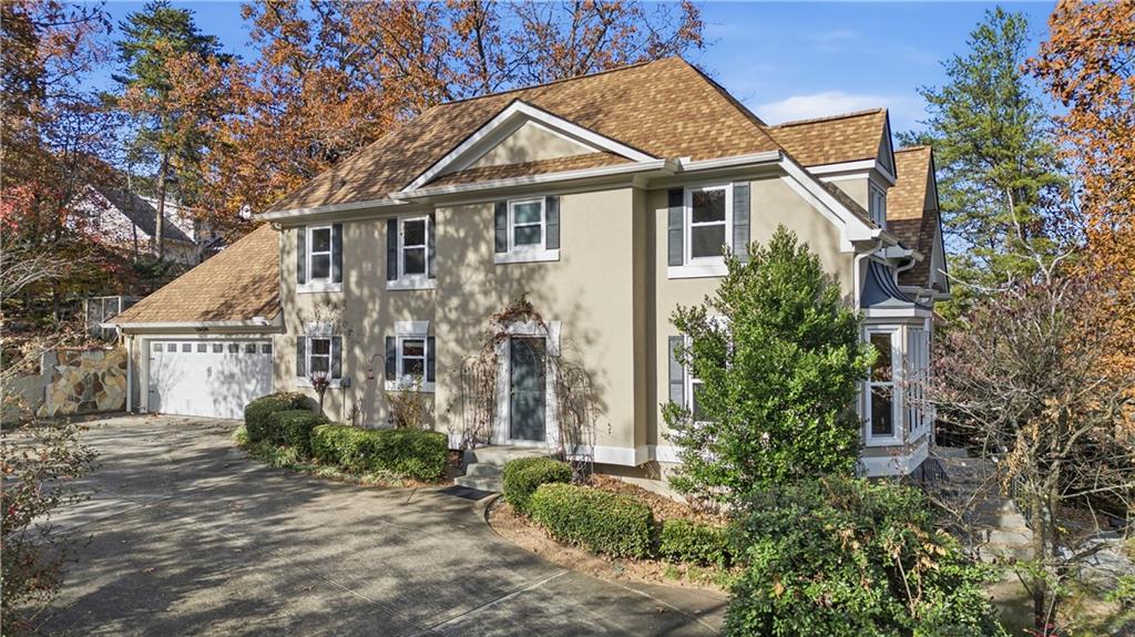 front view of a house with a small yard