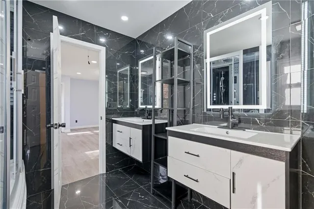 a bathroom with a toilet and shower