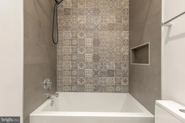 a bathroom with a bathtub