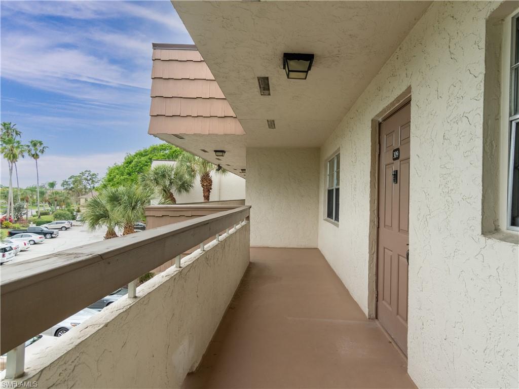 499 Forest Lakes Boulevard, Unit 2309 Naples, FL 34105 - Photo 19 of 29 a view of a balcony with a sink and dishwasher