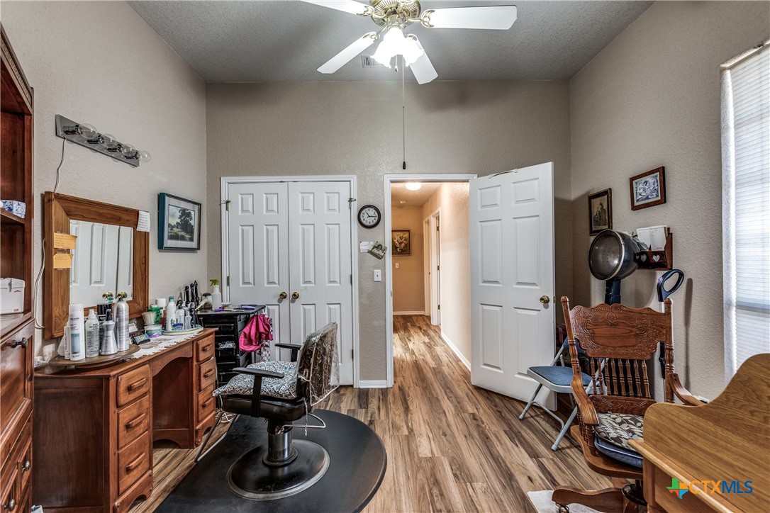 1408 County Road 3300 Kempner, TX 76539 - Photo 18 of 25 a living room with furniture and a wooden floor