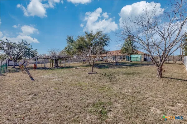 a view of beach and yard