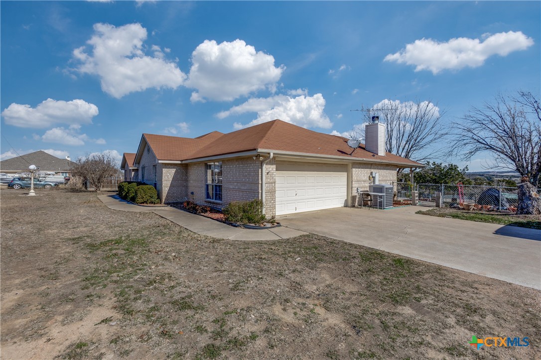 1408 County Road 3300 Kempner, TX 76539 - Photo 3 of 25 a view of a house with a yard