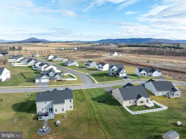 an aerial view of a house with a garden