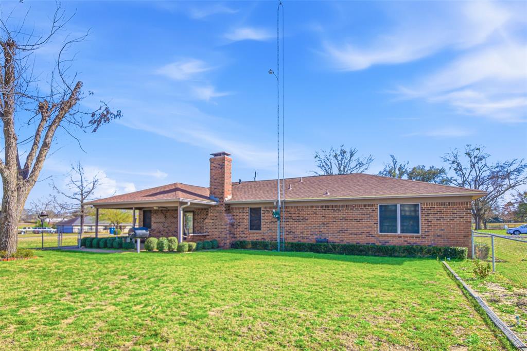 14202 Valleyview Ridge Tyler, TX 75709 - Photo 17 of 29 a front view of a house with garden