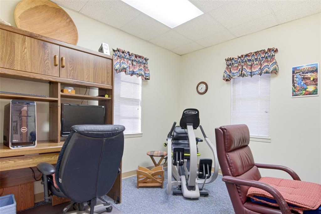 14202 Valleyview Ridge Tyler, TX 75709 - Photo 26 of 29 a room with furniture and a window