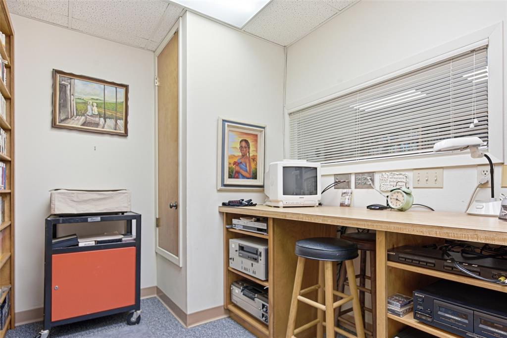 14202 Valleyview Ridge Tyler, TX 75709 - Photo 28 of 29 a kitchen with stainless steel appliances granite countertop a stove and cabinets