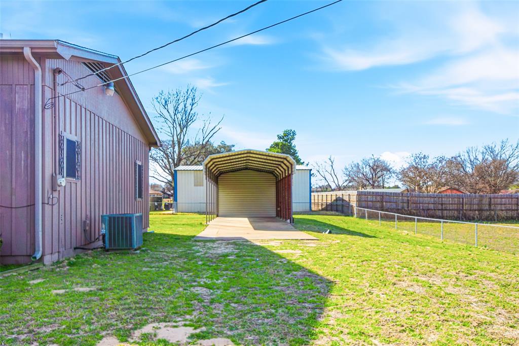 14202 Valleyview Ridge Tyler, TX 75709 - Photo 29 of 29 a view of a backyard with a garden and plants