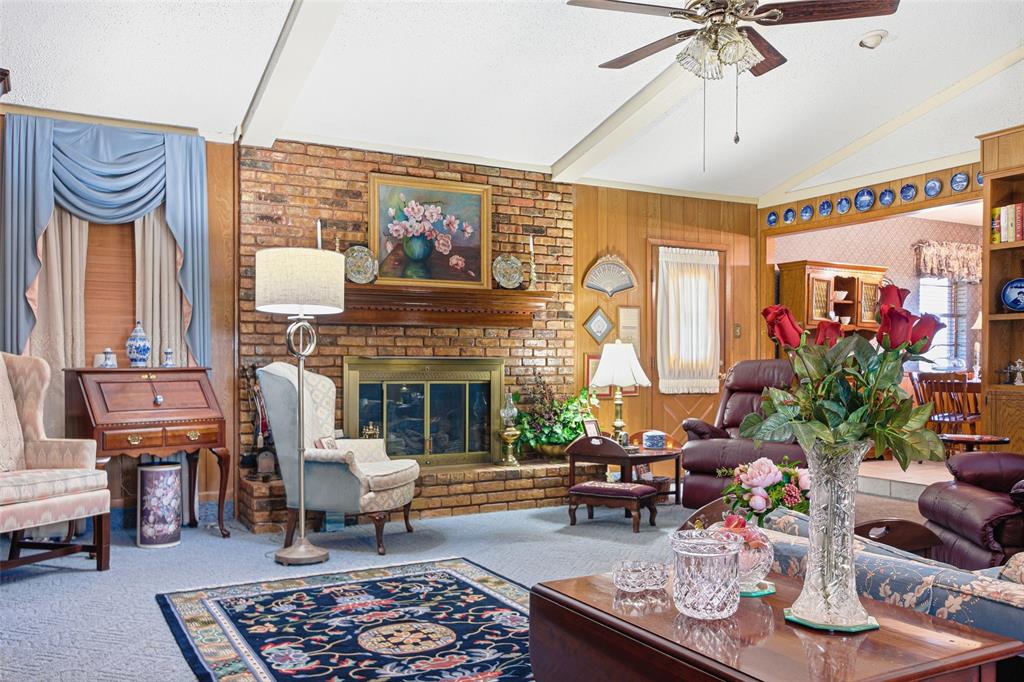 14202 Valleyview Ridge Tyler, TX 75709 - Photo 5 of 29 a living room with furniture and a fireplace