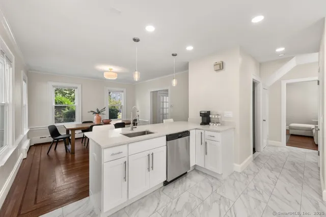 a kitchen with a sink and cabinets
