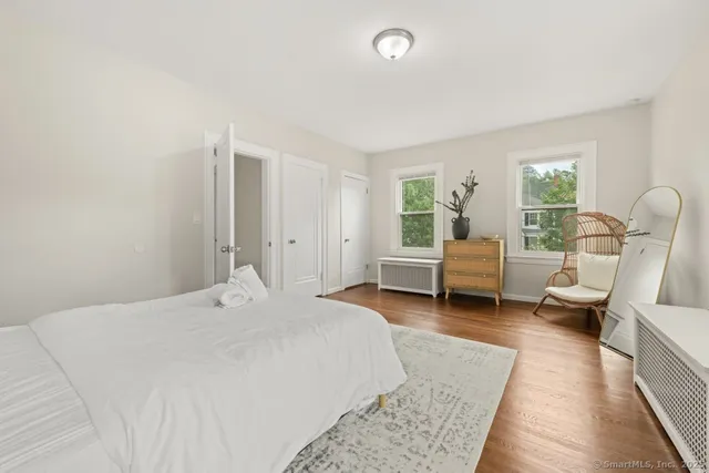 a bed room with a bed and a couch