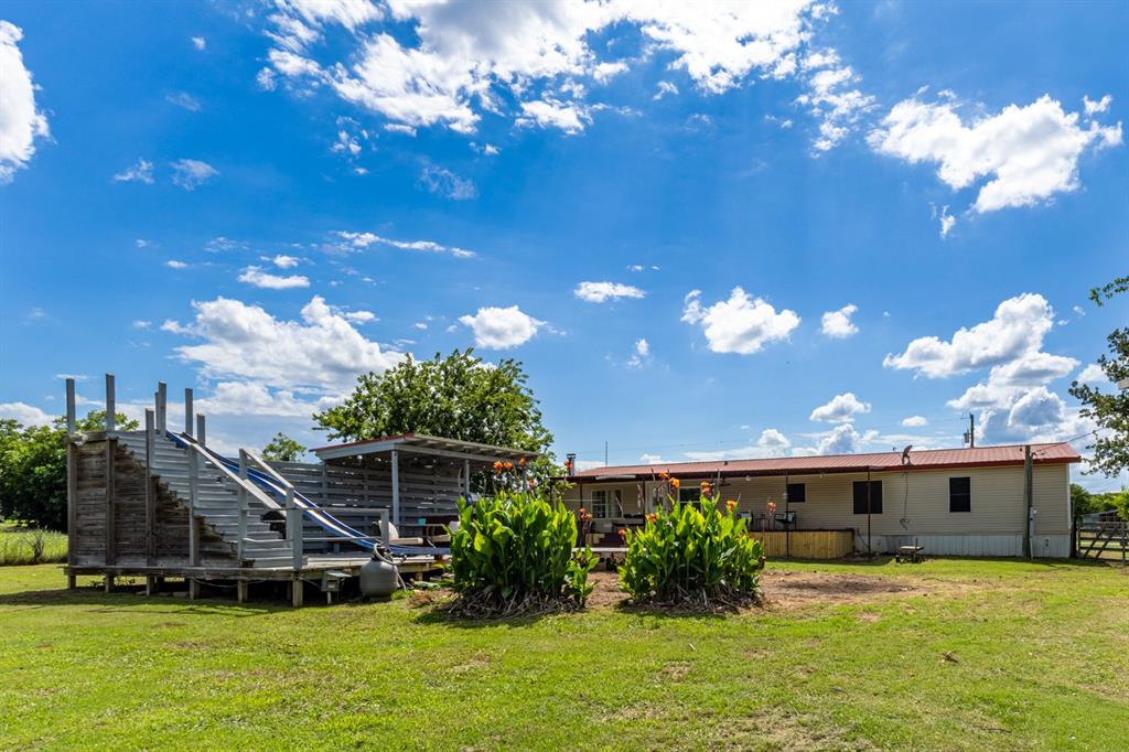 75 Southern Road Mineral Wells, TX 76067 - Photo 31 of 31 a view of a house with a yard