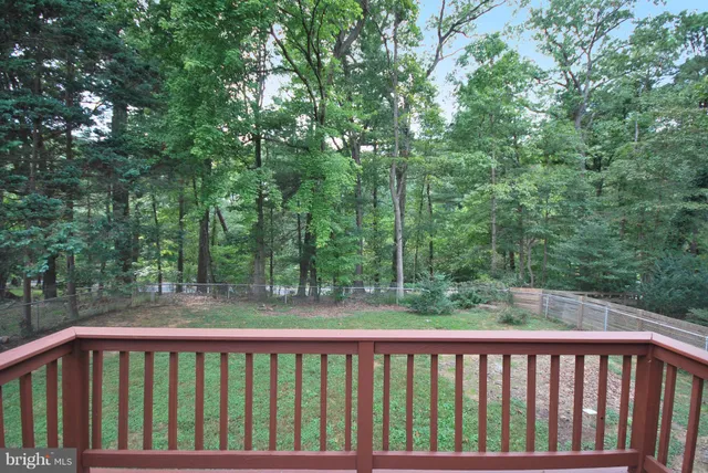 a view of balcony with trees