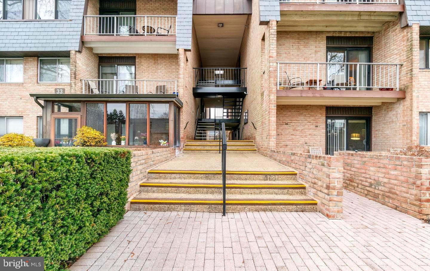 a front view of a house with a outdoor view