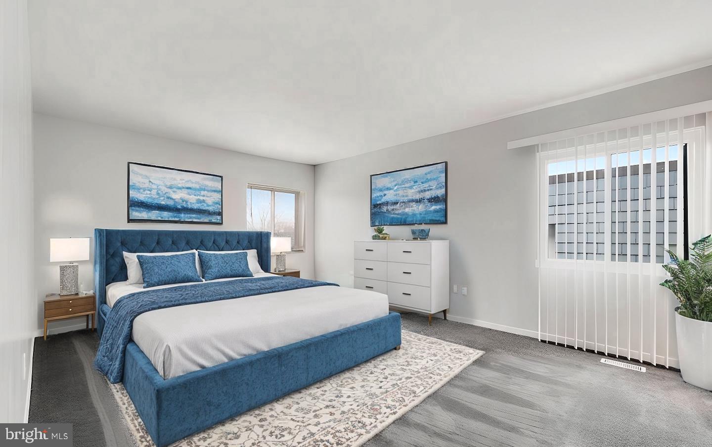 33 Stonehenge Circle, Unit 11 Baltimore, MD 21208 - Photo 12 of 22 a bedroom with a bed and a window