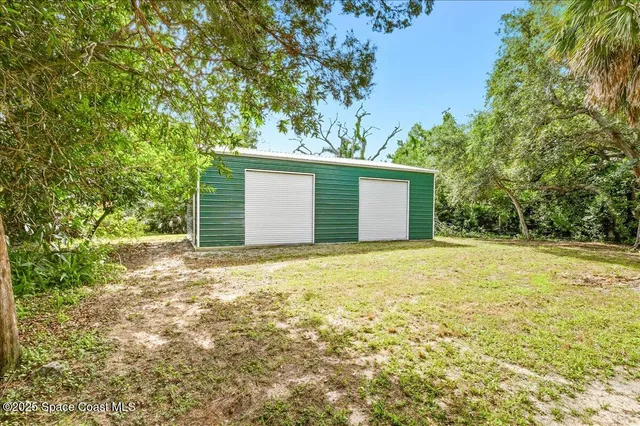 a house with trees in front of it
