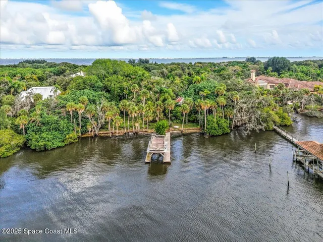 a view of a lake with a big yard