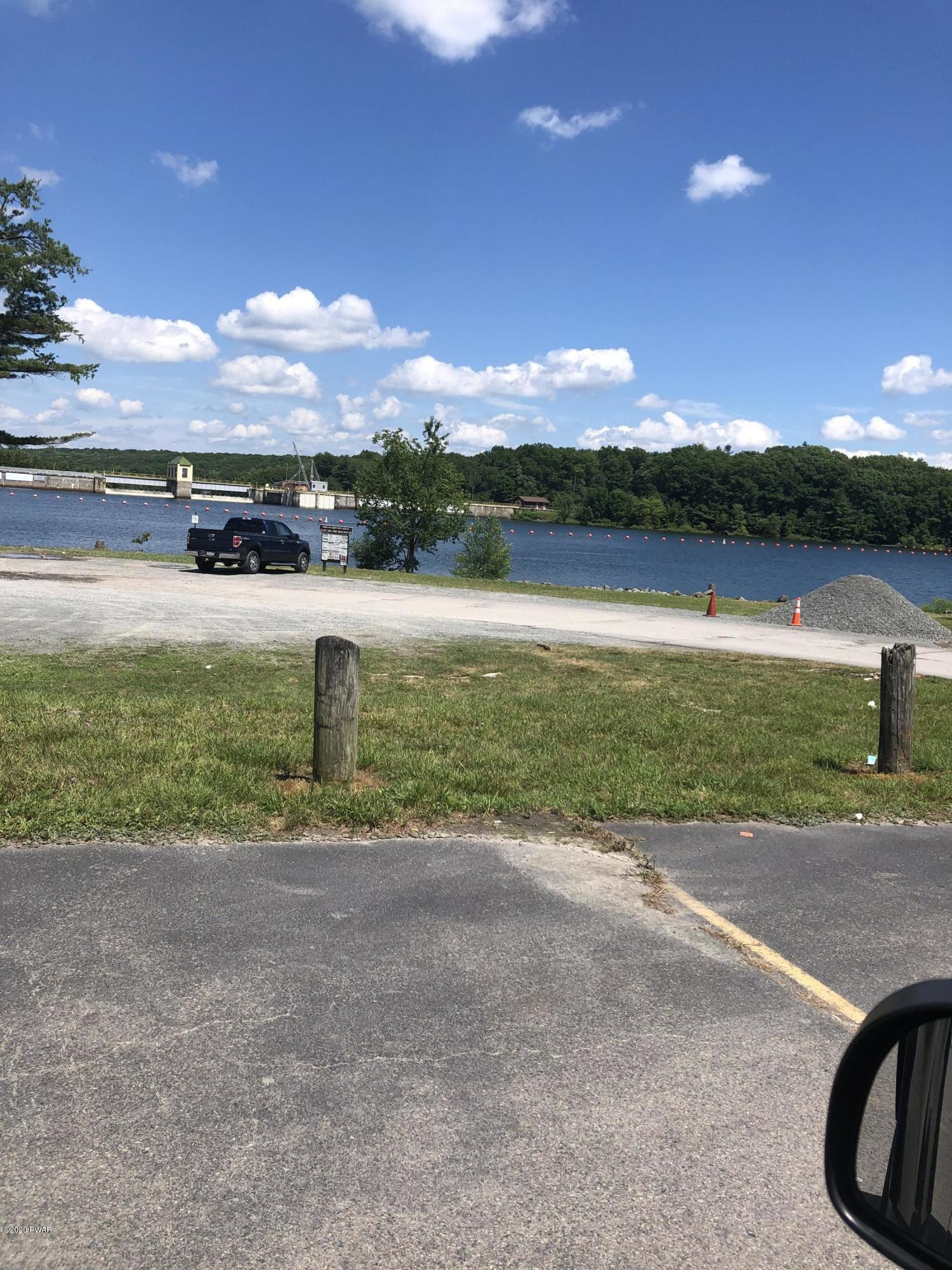 45 W Road Hawley, PA 18428 - Photo 18 of 19 a view of a lake with a mountain