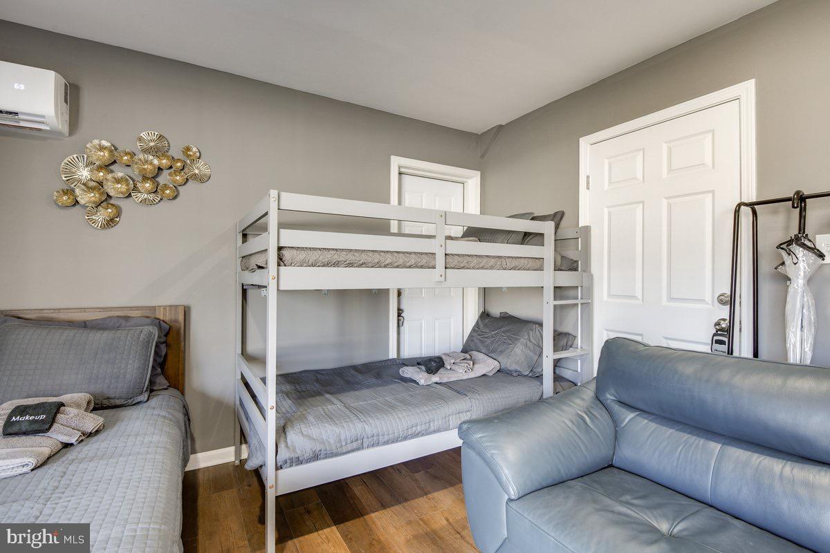 6604 Oak Street Cheverly, MD 20785 - Photo 12 of 16 a living room with furniture and a fireplace