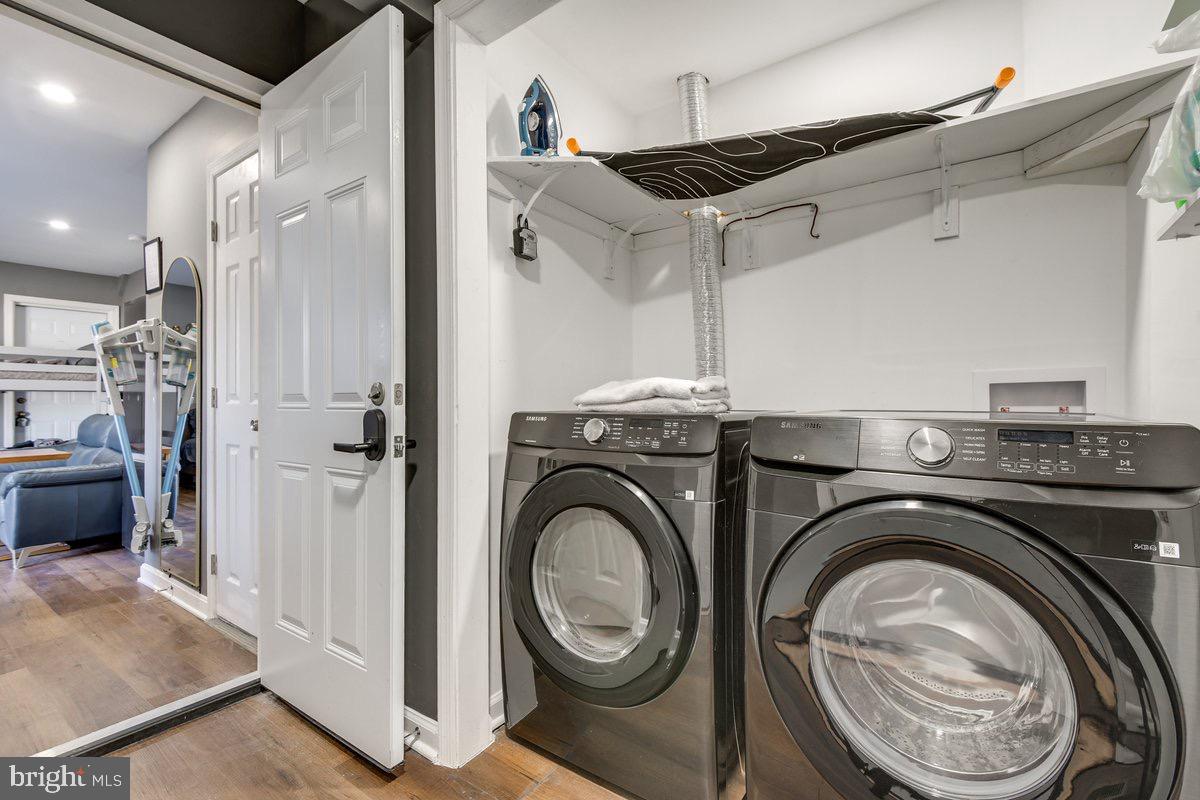 6604 Oak Street Cheverly, MD 20785 - Photo 15 of 16 a utility room with sink dryer and washer