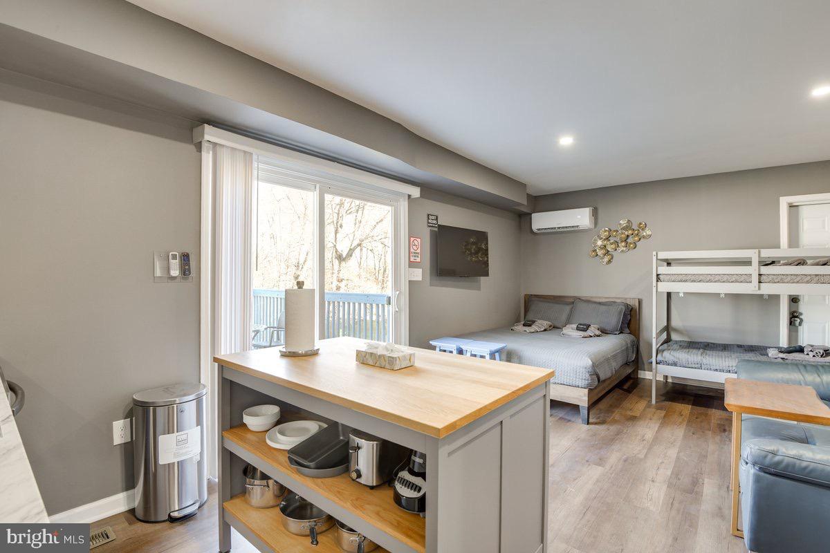6604 Oak Street Cheverly, MD 20785 - Photo 7 of 16 a view of a livingroom with furniture window and wooden floor
