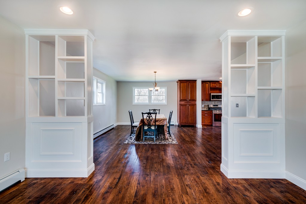 10 Felch Road Natick, MA 01760 - Photo 11 of 27 a dining room with furniture and wooden floor