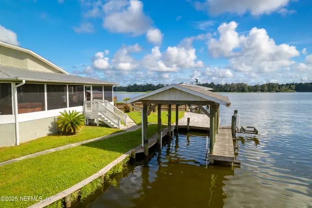 a view of a house with swimming pool