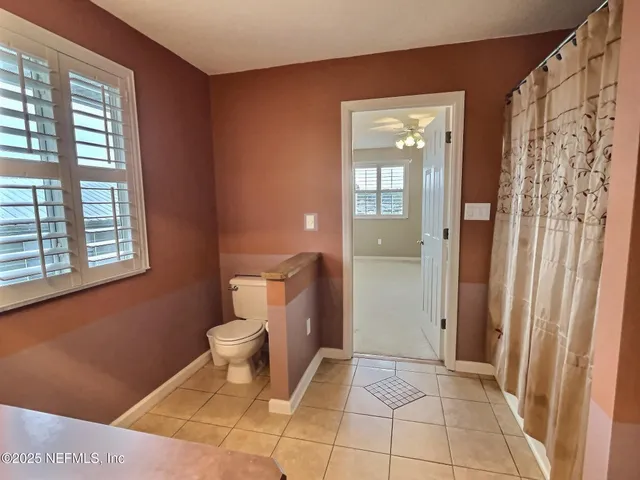 a bathroom with a sink double vanity and a mirror