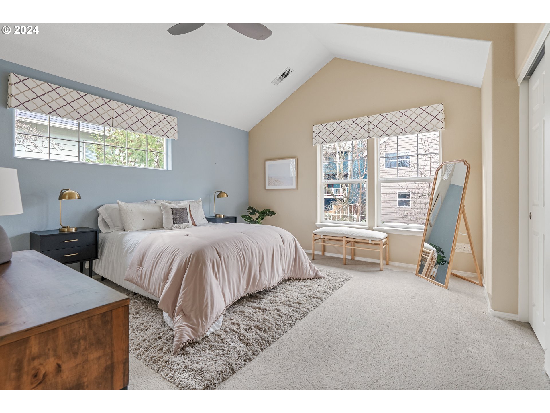 3531 South Kelly Avenue Portland, OR 97239 - Photo 14 of 21 a bedroom with a bed and a large window