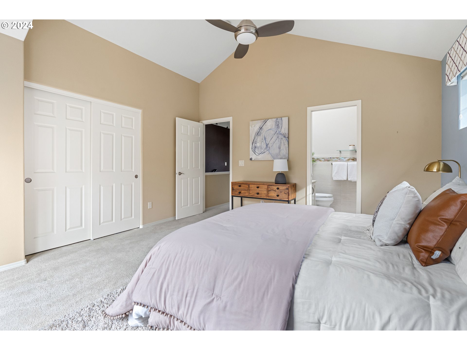 3531 South Kelly Avenue Portland, OR 97239 - Photo 15 of 21 a bedroom with a bed and closet