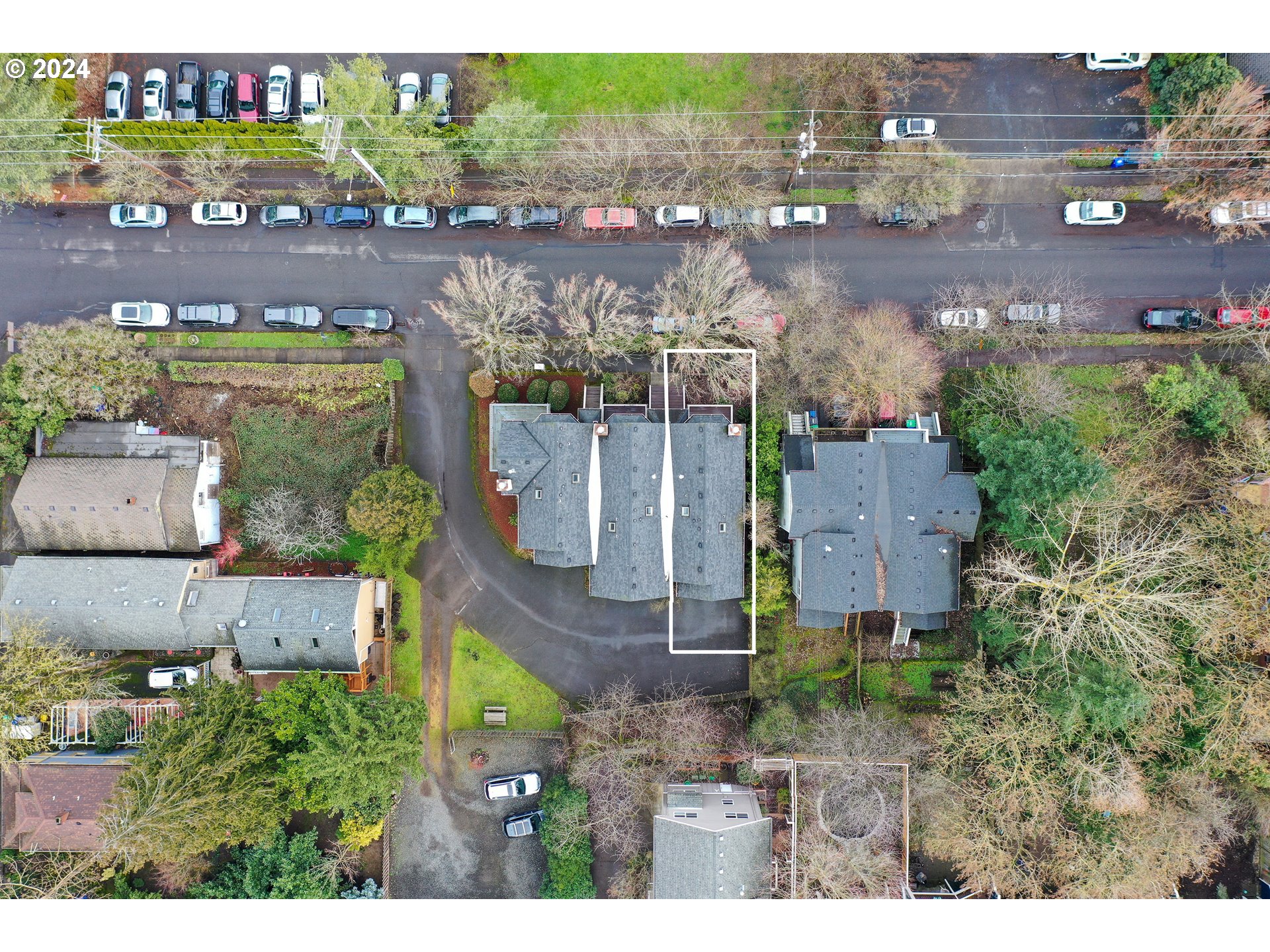 3531 South Kelly Avenue Portland, OR 97239 - Photo 20 of 21 an aerial view of a house with a yard and lake view