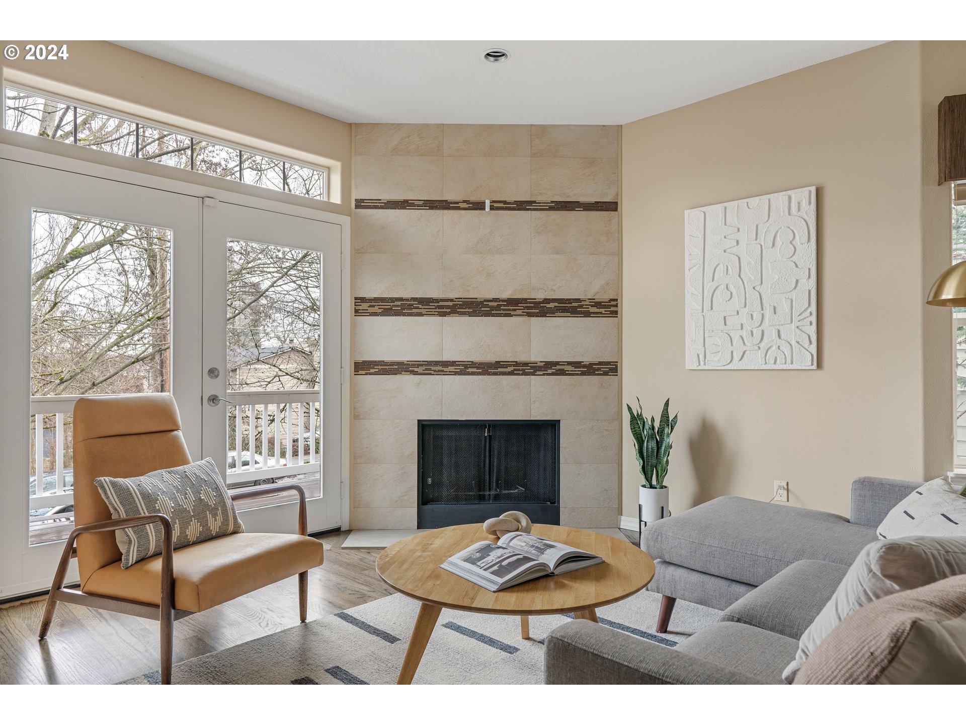 3531 South Kelly Avenue Portland, OR 97239 - Photo 3 of 21 a living room with furniture and a fireplace