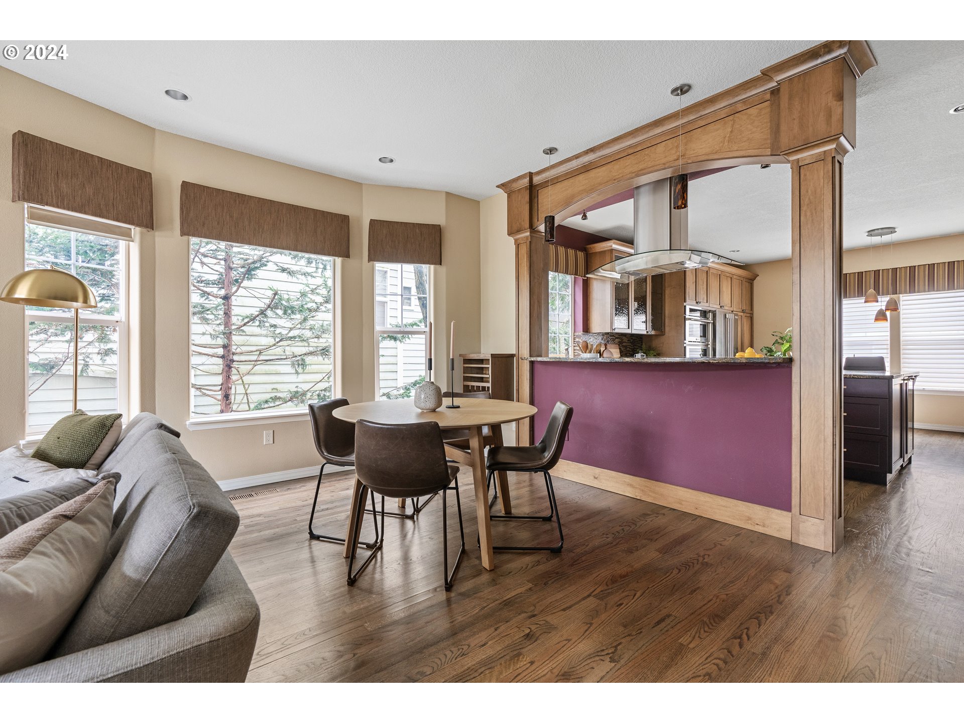 3531 South Kelly Avenue Portland, OR 97239 - Photo 5 of 21 a dining room with furniture and wooden floor