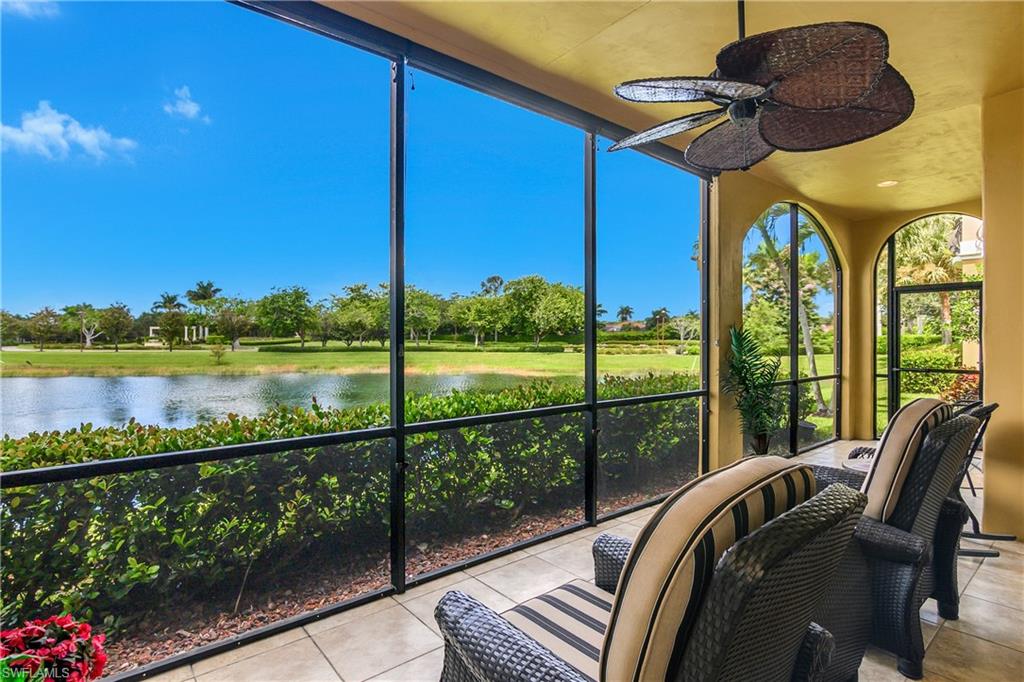 9109 Prima Way, Unit 102 Naples, FL 34113 - Photo 30 of 50 a view of balcony with furniture and garden