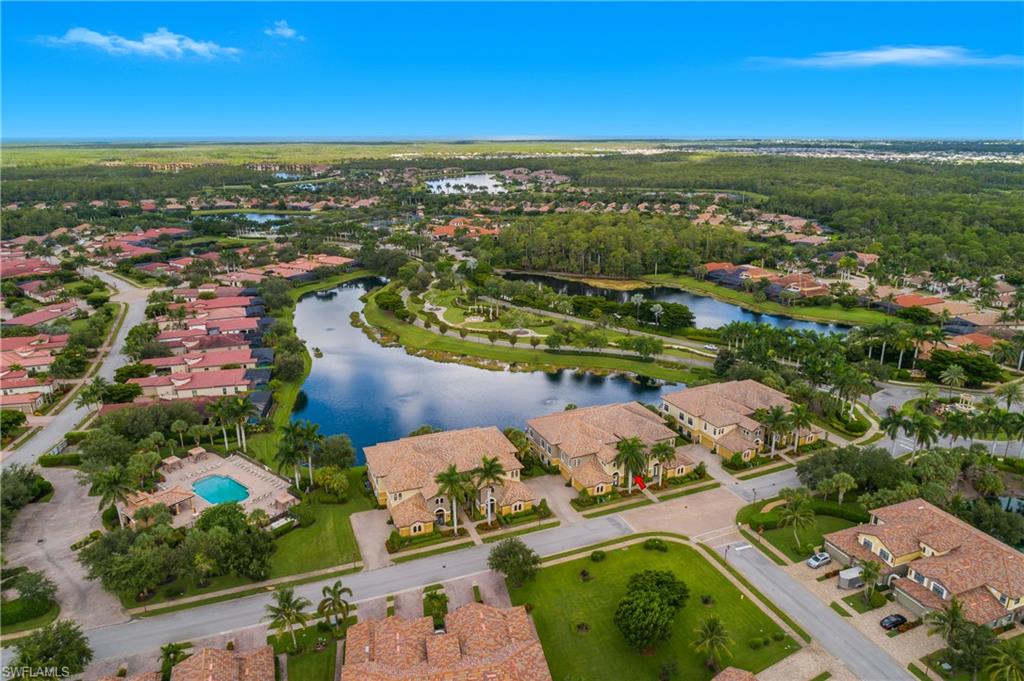 9109 Prima Way, Unit 102 Naples, FL 34113 - Photo 37 of 50 an aerial view of residential houses with outdoor space