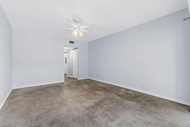 an empty room with a bathroom