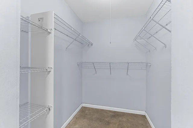 a view of a room with racks on the wall