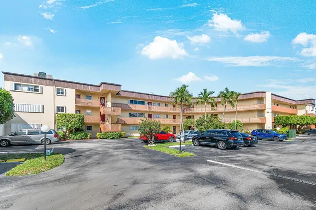 a cars parked in front of a building