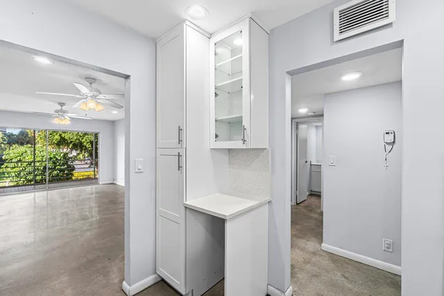 a view of bathroom with a shower and a sink