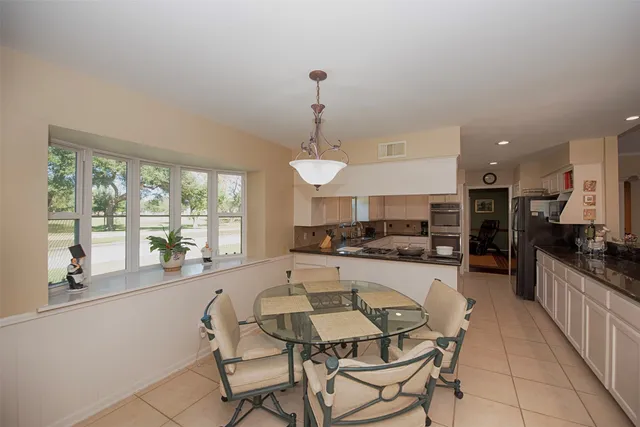 $565,000 | 18502 Vinland Drive, Nassau Bay, TX 77058