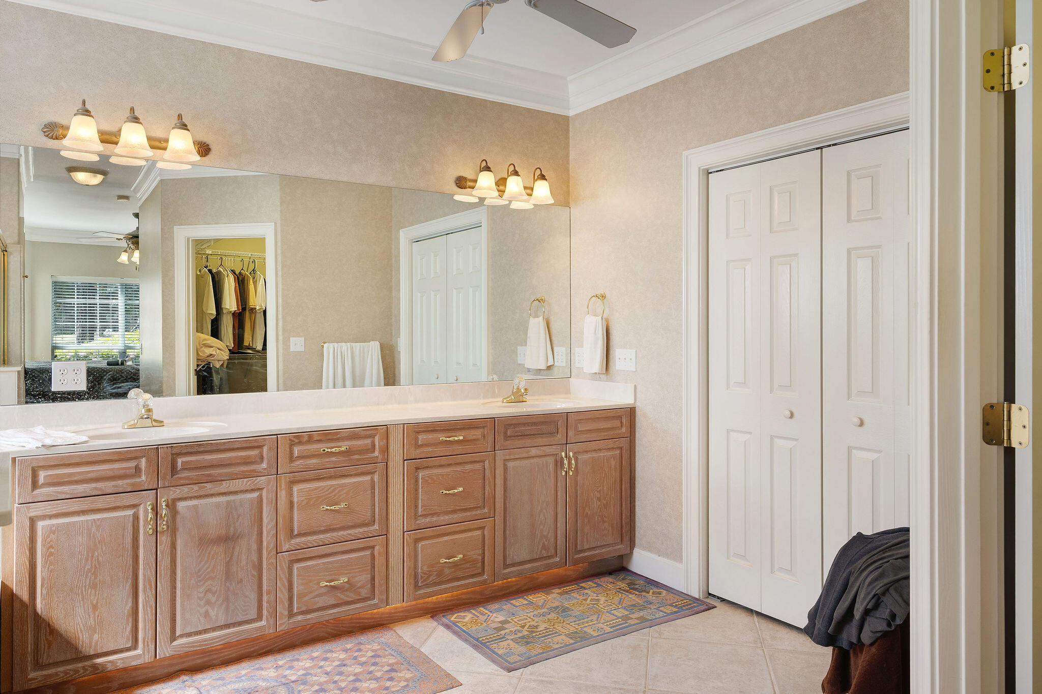 29 Ivory Court Miramar Beach, FL 32550 - Photo 16 of 39 a spacious bathroom with a granite countertop sink a mirror and a bathtub