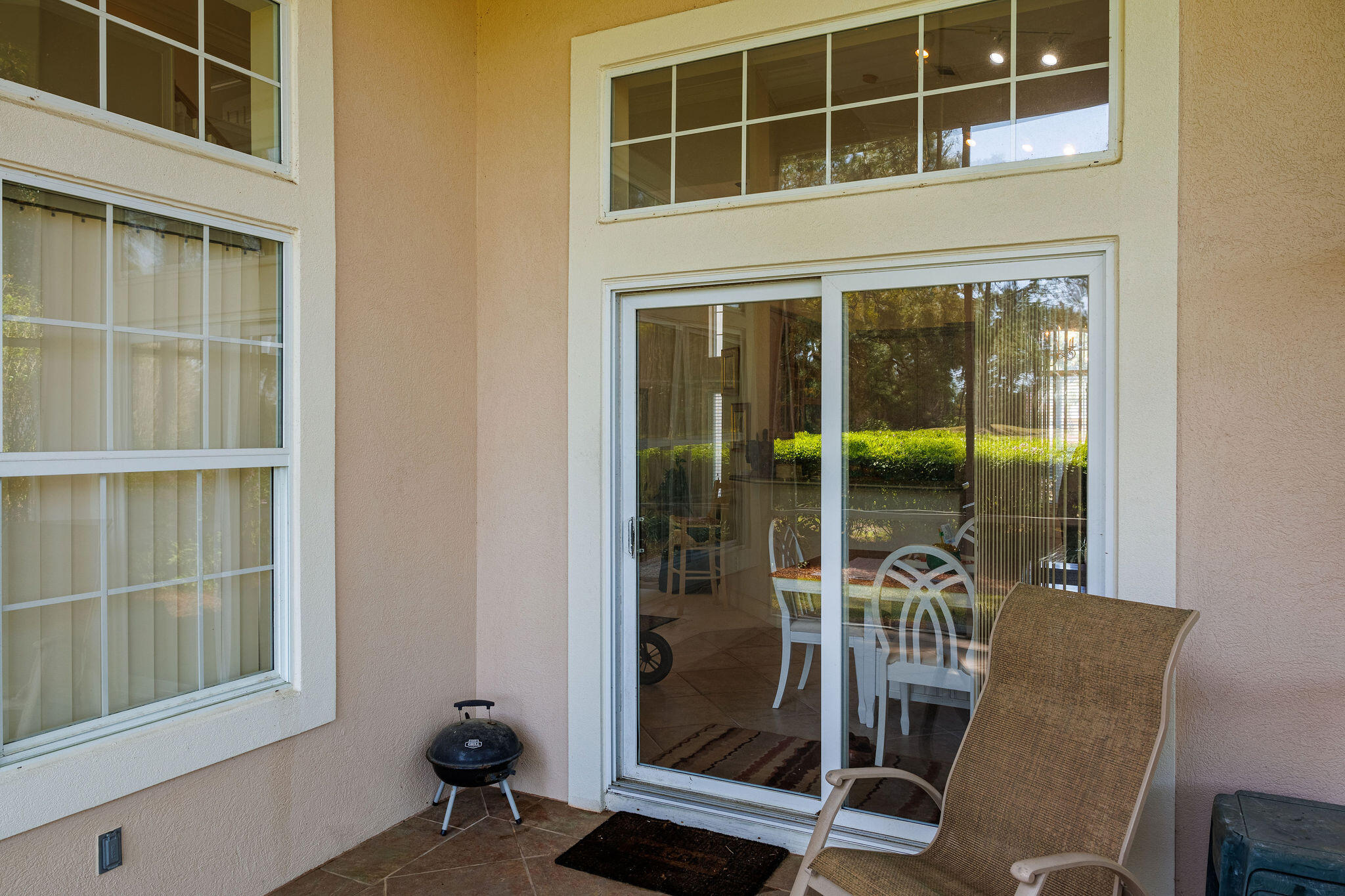 29 Ivory Court Miramar Beach, FL 32550 - Photo 30 of 39 a view of a balcony with a dining table and chairs