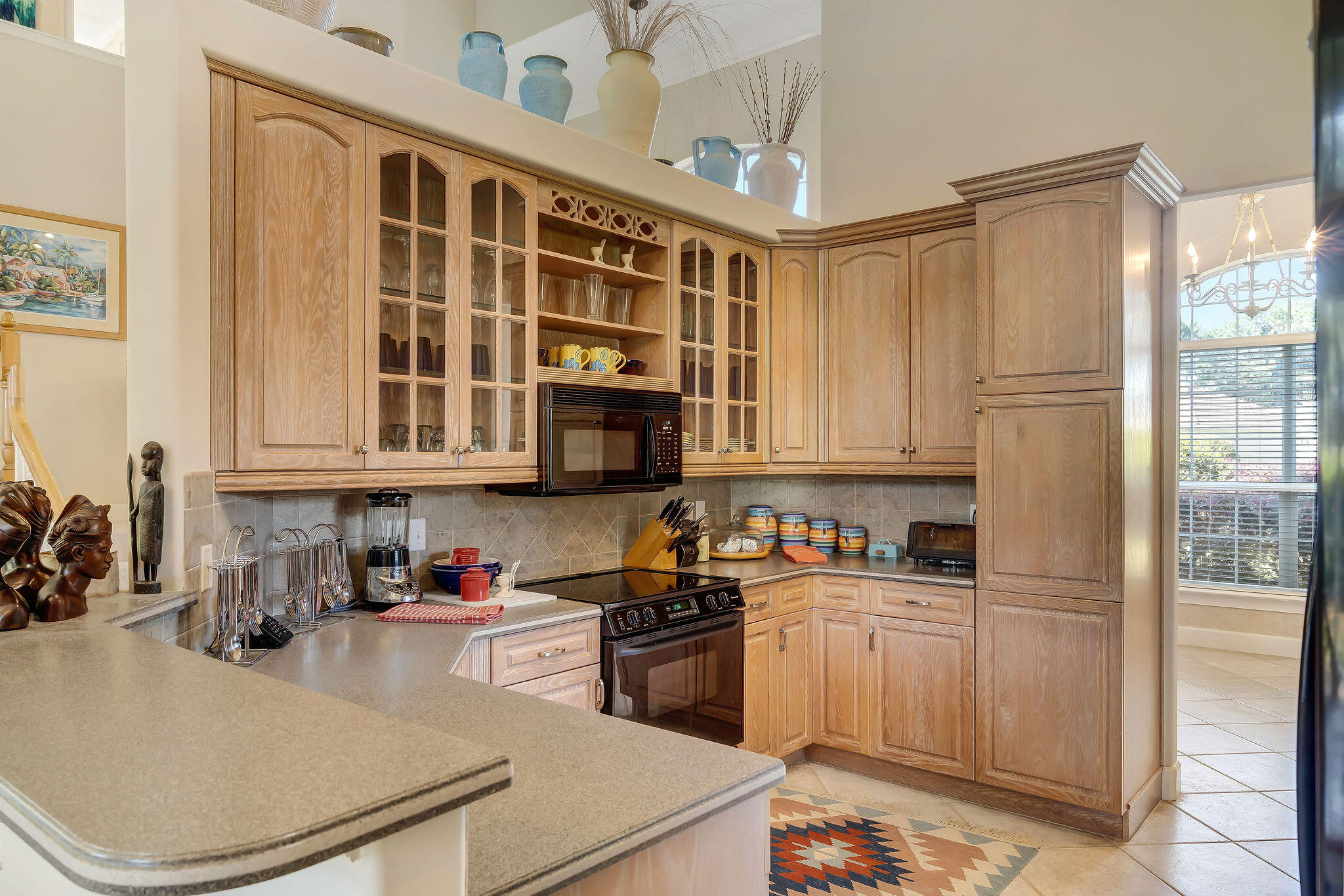 29 Ivory Court Miramar Beach, FL 32550 - Photo 4 of 39 a kitchen with stainless steel appliances granite countertop a sink a stove and a refrigerator