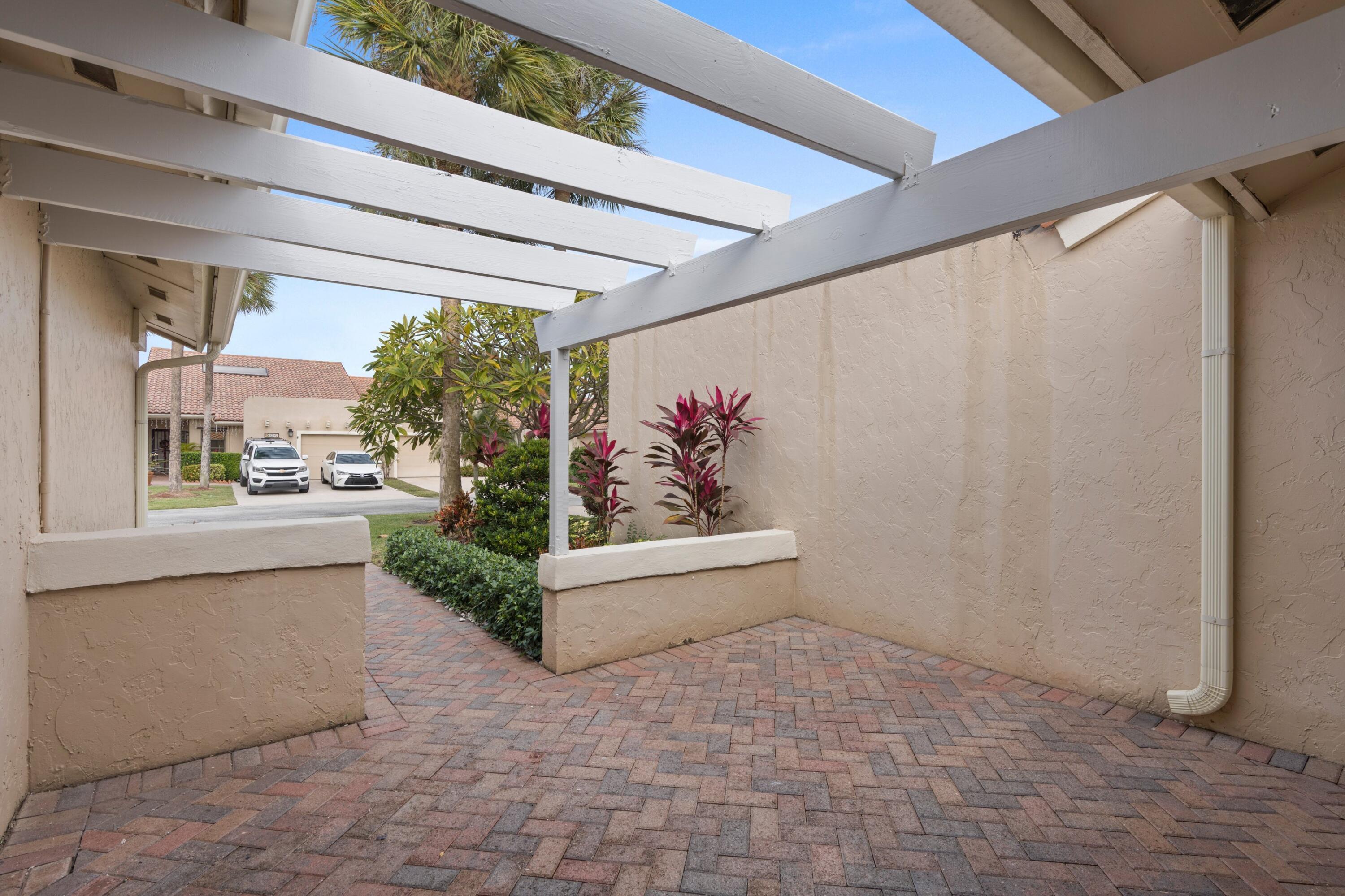 6944 Escobar Court Boca Raton, FL 33433 - Photo 19 of 36 Front Patio