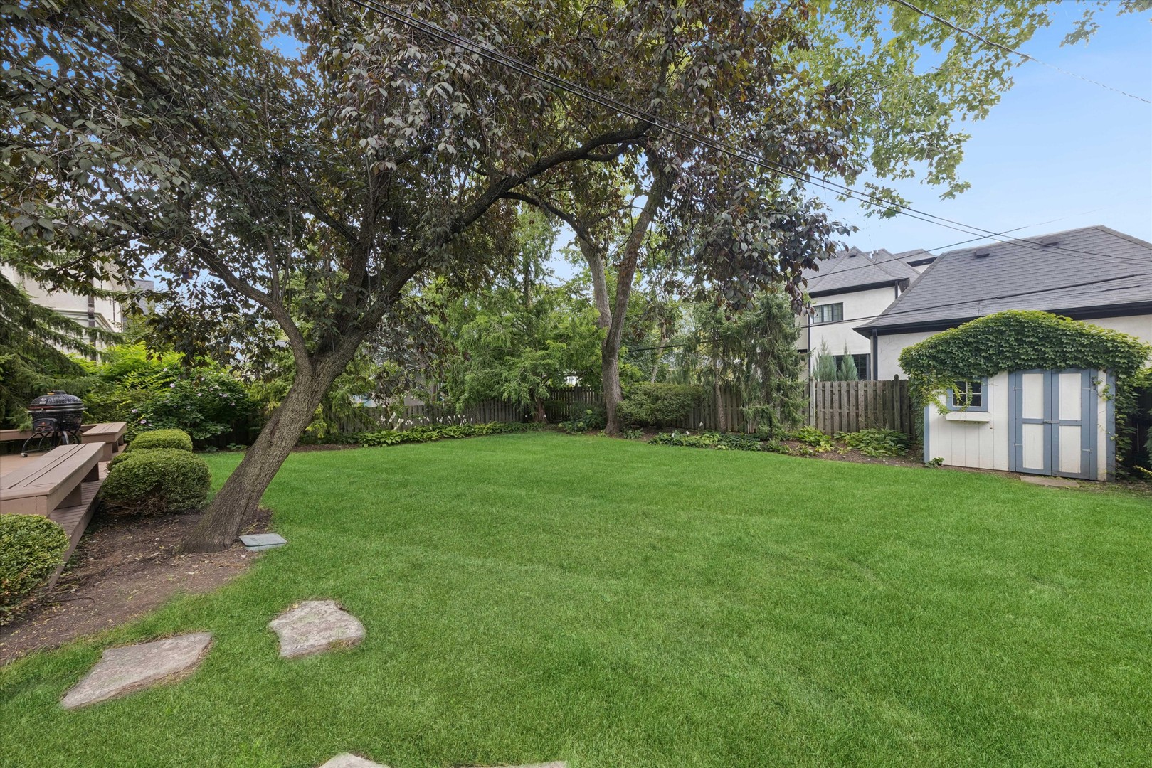 561 North County Line Road Hinsdale, IL 60521 - Photo 25 of 30 a view of a house with a backyard