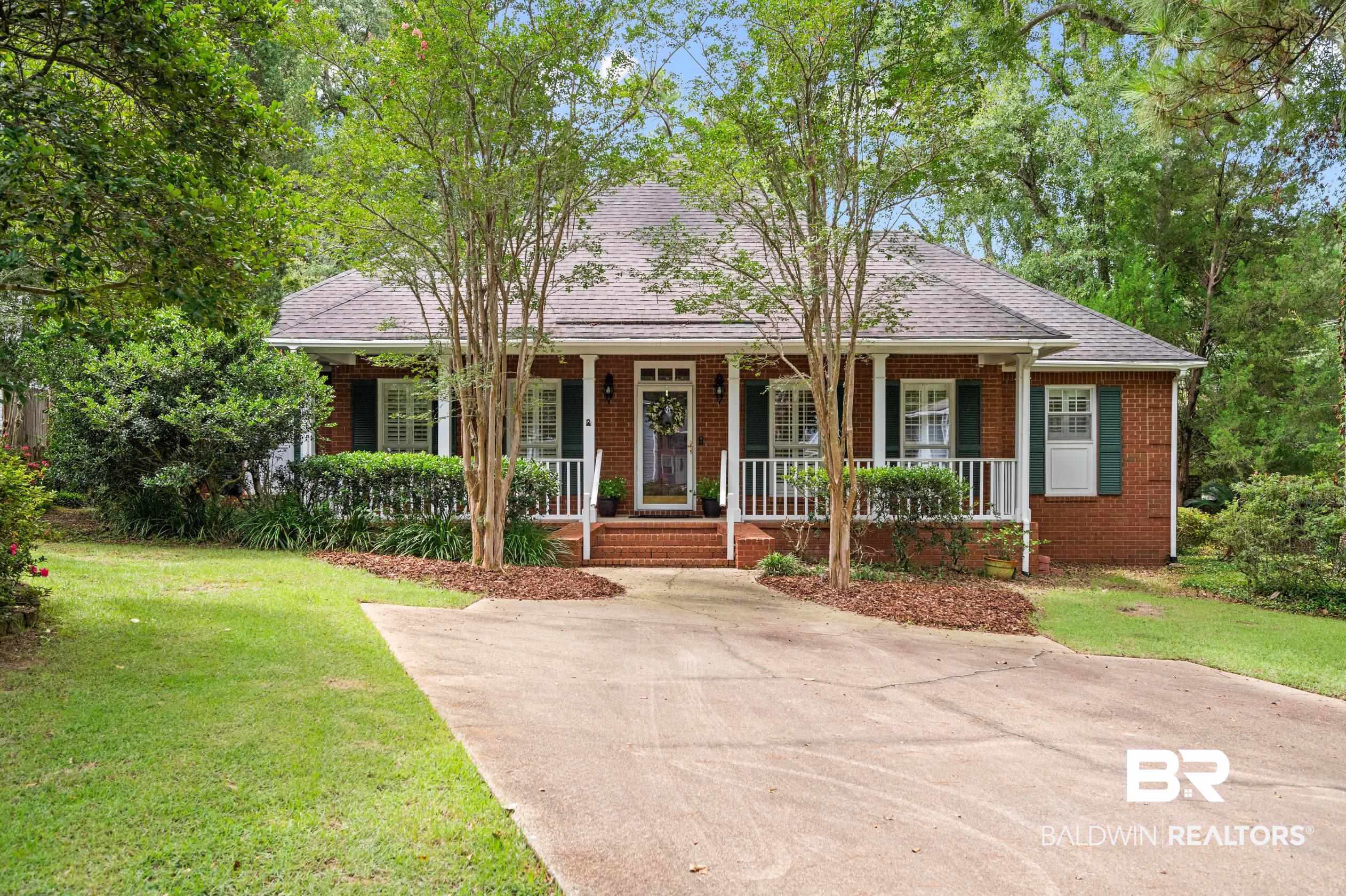 6638 Jackson Square Daphne, AL 36526 - Photo 8 of 62 Ranch-style house featuring a front yard and covered porch