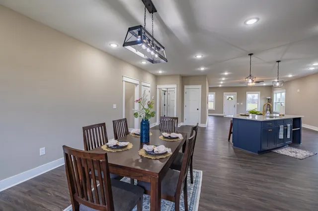 a view of living room with sink and wooden floor