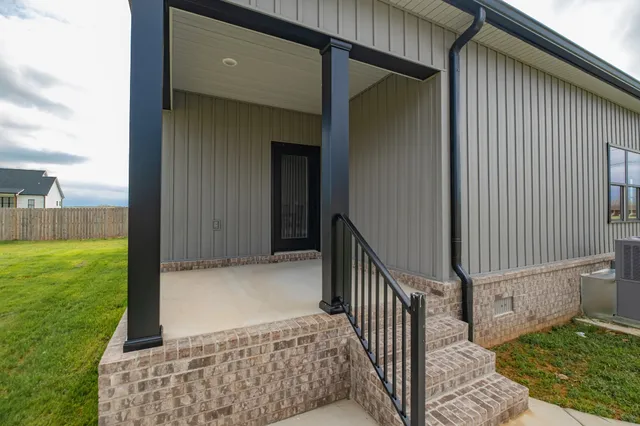 a view of kitchen and dining room with wooden floor