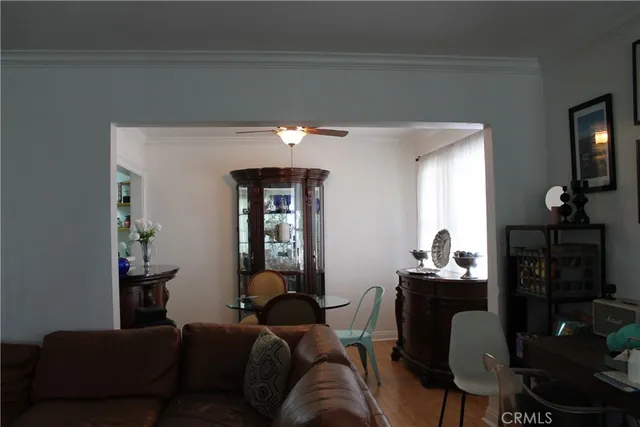 a kitchen with stainless steel appliances granite countertop a refrigerator and a stove